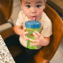 Child drinking from The First Years Bluey Baby Straw Cup, 12 Oz, featuring a blue lid and butterfly design.