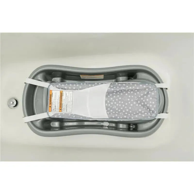 3-in-1 baby bathtub in grey, featuring a removable mesh sling with a polka dot pattern for newborns to toddlers.