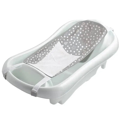 3-in-1 baby bathtub with a white exterior and a gray, polka-dotted mesh sling for infants.