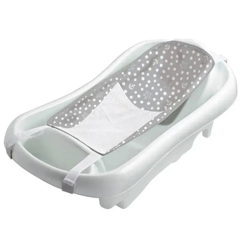 3-in-1 baby bathtub designed for newborns to toddlers, featuring a white exterior and a padded gray mesh reclining seat with polka dots.