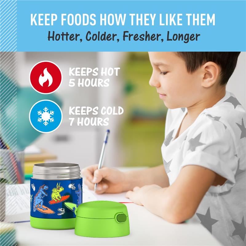 Thermos FUNtainer food jar with dinosaur design, keeping food hot for 5 hours and cold for 7 hours, beside a child writing.