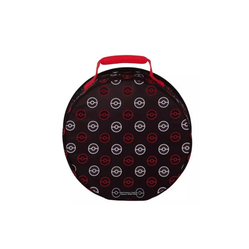 Round black lunch box featuring a pattern of red and white Pokéballs, with a red carrying handle on top.
