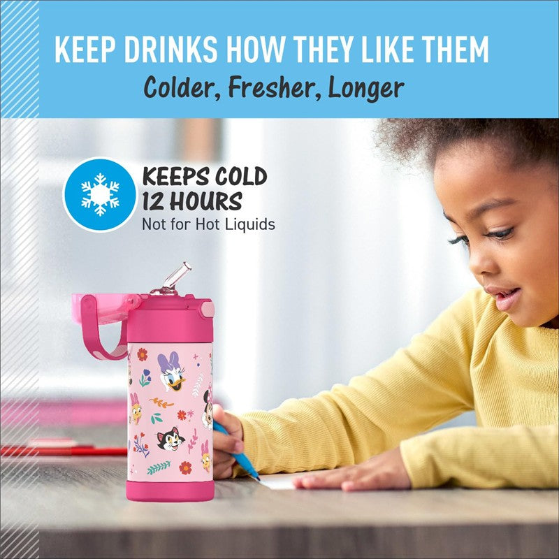 Thermos FUNtainer Minnie Mouse water bottle, 12 oz, pink with floral designs, keeps drinks cold for 12 hours. Child writing nearby.