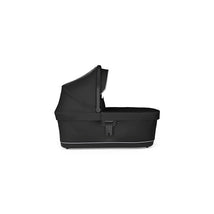 Thule Bassinet in black, featuring a protective canopy and a sleek design ideal for newborns.