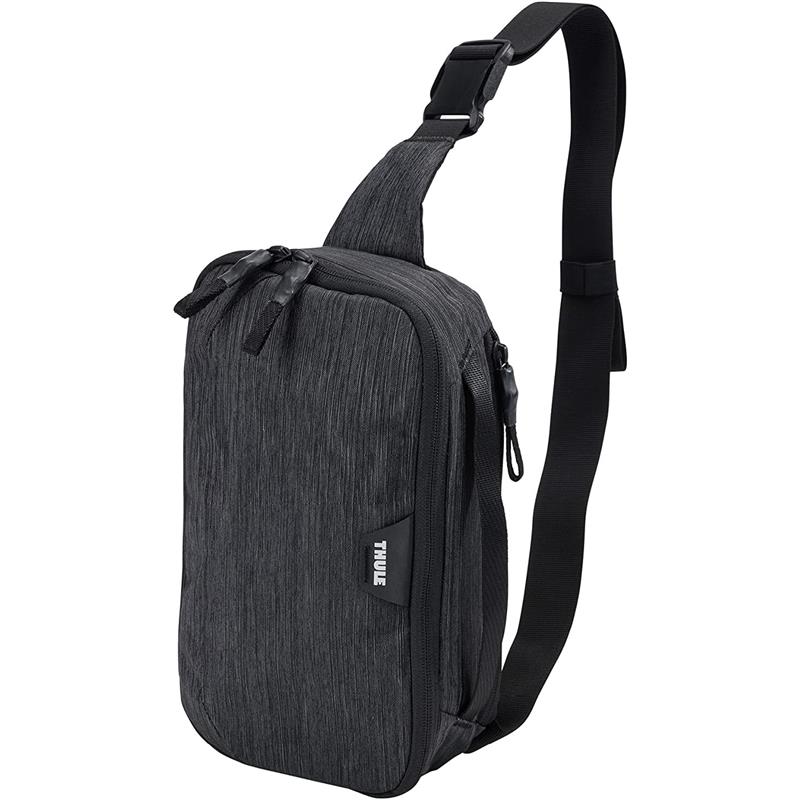 Compact black Thule changing backpack with dual zipper compartments and an adjustable shoulder strap.