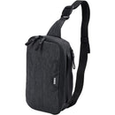 Compact black Thule changing backpack with dual zipper compartments and an adjustable shoulder strap.