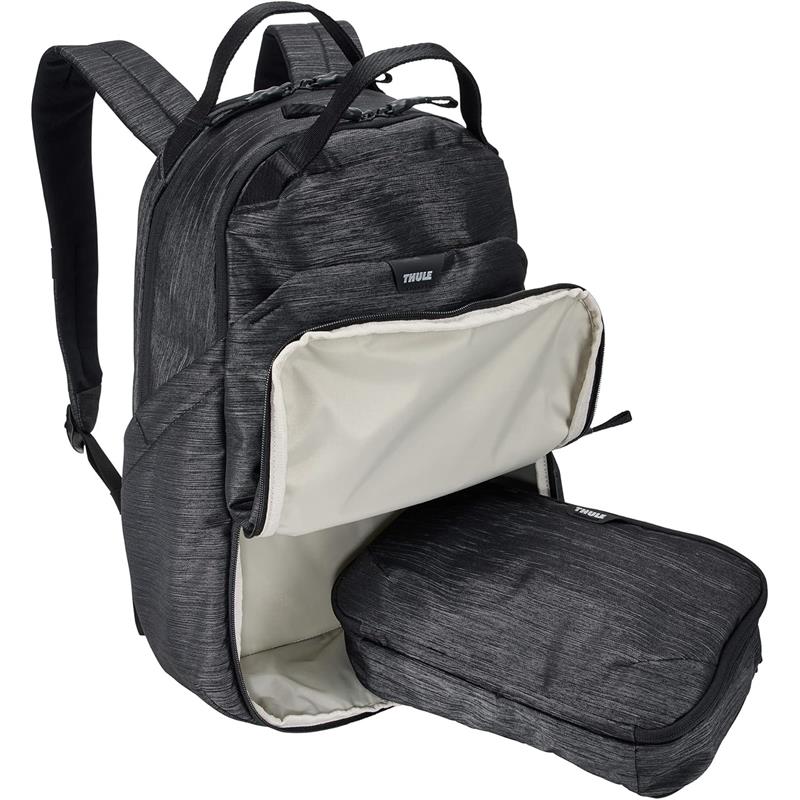 Thule Changing Backpack in black, featuring a spacious main compartment and an external removable organizer.