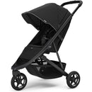 Compact black Thule Spring 2 all-terrain stroller with a large canopy and storage basket, designed for single child use.