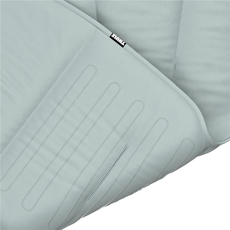 Thule stroller seat liner in light gray with textured lines and logo, designed for added comfort and support.