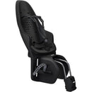 Thule Yepp 2 Maxi Frame Mount in Midnight Black, designed for safe child transport on bicycles, featuring adjustable harness and sturdy frame.