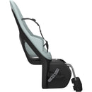 Thule Yepp 2 Maxi Rack Mount child bike seat in light blue, featuring safety harness and adjustable mounting bracket.
