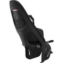 Thule Yepp 2 Maxi Rack Mount child bike seat in midnight black, featuring adjustable straps and ventilation holes.