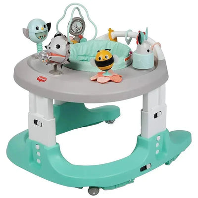 Tiny Love Black & White 4-In-1 Baby Walker featuring interactive toys, a gray top, and teal base for mobility and play.
