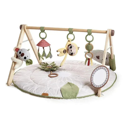 Tiny Love Boho Chic Gymini Play Mat featuring plush toy attachments, a mirror, and a soft floral-patterned mat for baby play.
