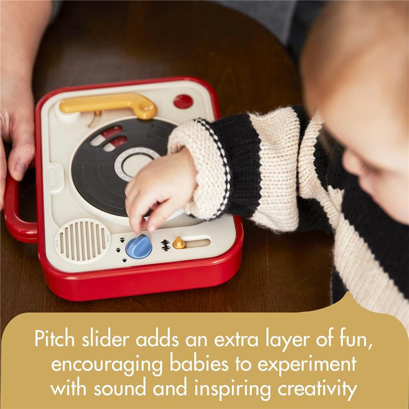 Toy DJ station for babies featuring a pitch slider and vibrant buttons; encourages sound exploration and creativity.