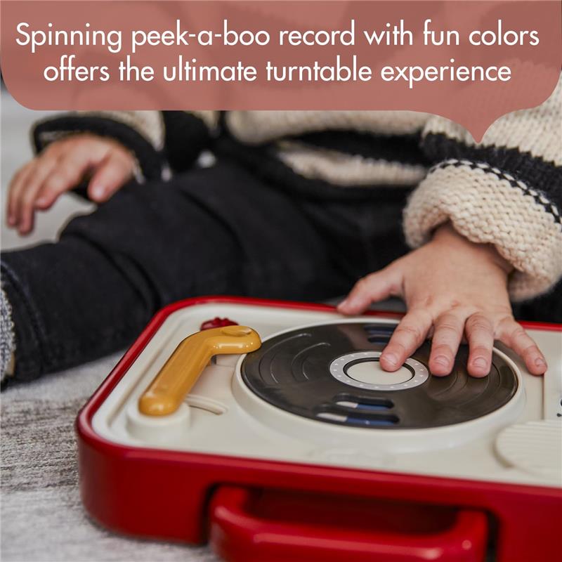 Tiny Love Tiny Rockers Dj Station Toy with a spinning peek-a-boo record, designed for interactive play, featuring vibrant colors.