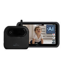 AI-powered Tiny Traveler baby monitor displaying a smiling child on the screen, with a camera and monitor side by side.