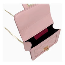 Black quilted mini purse with gold chain strap, open to show inner compartment and branded card.