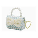 Tweed purse in blue with a pearl handle and a large pearl bow detail, perfect for tiny treats or accessories.