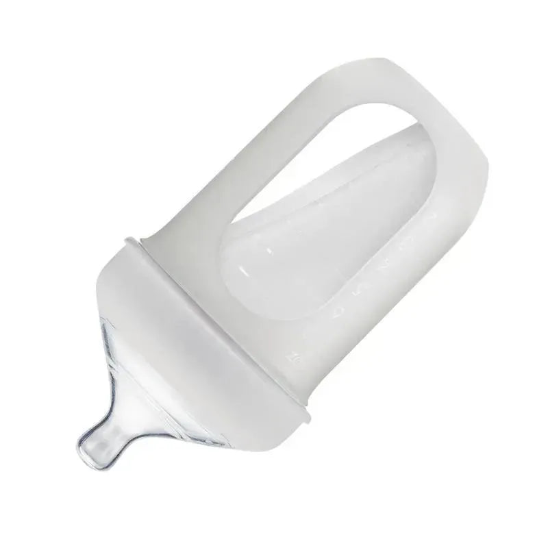Light gray Tomy Boon silicone bottle, 8 oz, featuring an ergonomic design and a clear silicone body with a narrow spout.