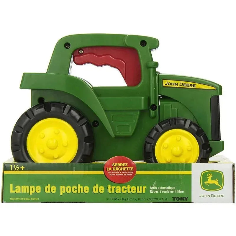 John Deere Roll N Go Flashlight toy in the shape of a green tractor with yellow wheels, featuring a trigger for light activation.