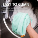 Removable, machine washable mint green cover being held, demonstrating ease of cleaning for the Tomy Puff Inflatable Bather.