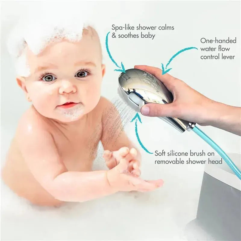 Tomy Rain Shower Spa Bath features a baby in a bubbly bath, with a hand holding a shower head that has a silicone brush.