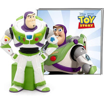 Tonies Buzz Lightyear audio toy figurine standing on a green base, next to a Toy Story 2 booklet featuring Buzz Lightyear.