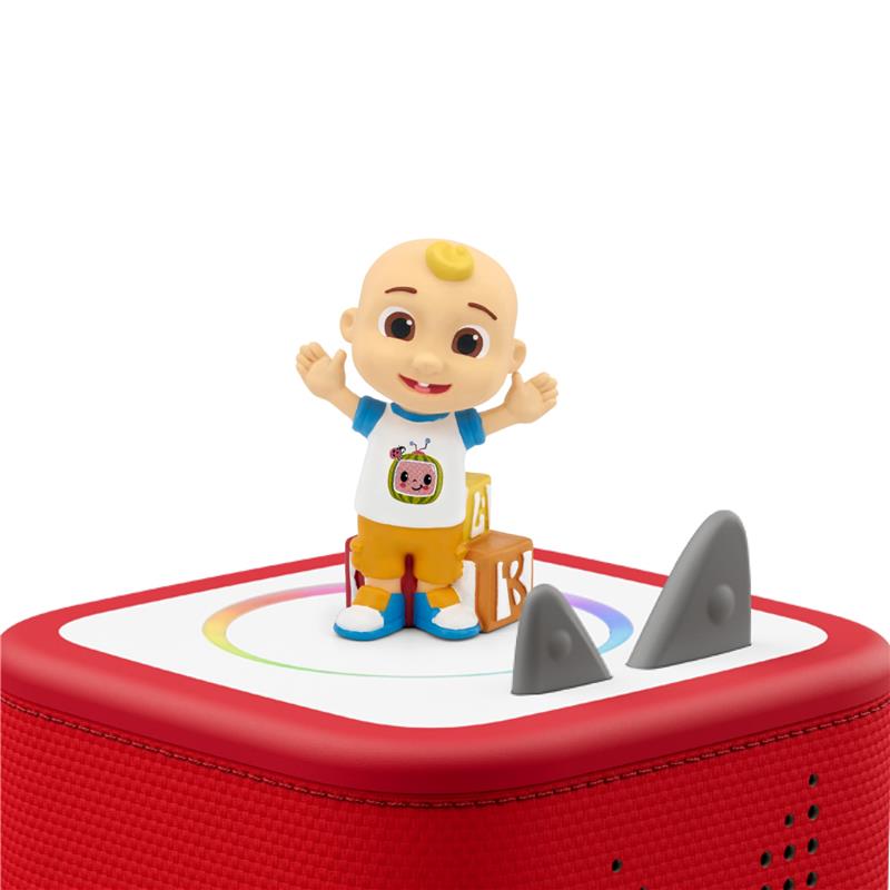 CoComelon JJ Audio Toy Figurine, featuring a smiling character in a colorful outfit on a red base with buttons and shapes.