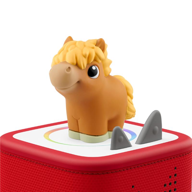 Soft, squeezable horse figurine from the Tonies My First Farm Set on a red audio toy base.