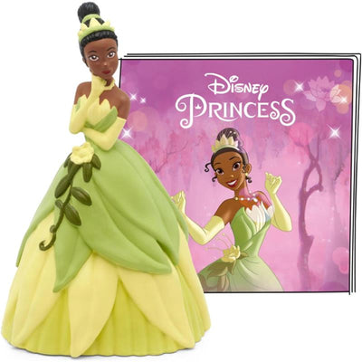 Tiana figurine in a green dress with flower details, alongside a pink Disney Princess storybook.
