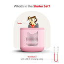Toniebox 2 audio player in cloud pink with a Playtime Puppy figure on top and USB-C charging cable included.