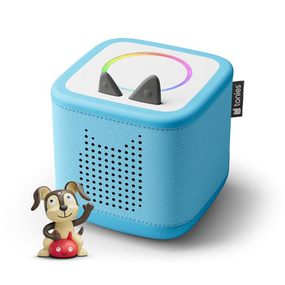 Toniebox audio player in sky blue with playtime puppy figurine and colorful sound control dial on top.