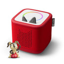 Toniebox 2 audio player in sunset red with playful puppy figurine, designed for children aged 1 and up.