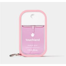 Touchland Bubblegum Hand Mist in a pink case, featuring a spray nozzle and label for hydrating hand sanitizer.