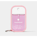 Touchland Bubblegum Hand Mist in a pink case, featuring a spray nozzle and label for hydrating hand sanitizer.