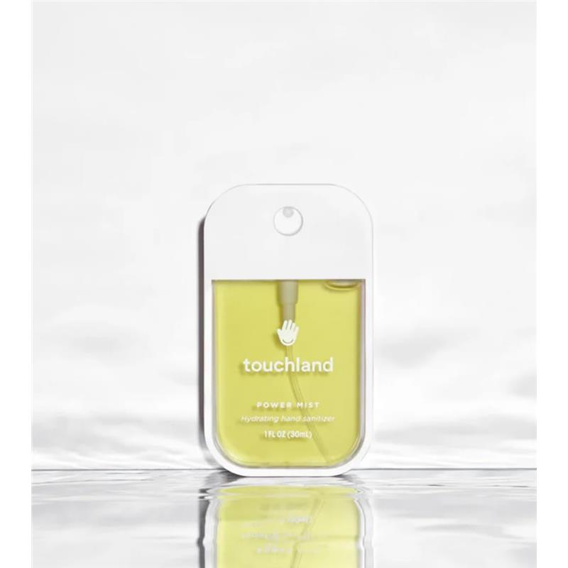 Touchland Vanilla Blossom Power Mist Hydrating Hand Sanitizer in a clear bottle with yellow liquid, 1 fl oz.