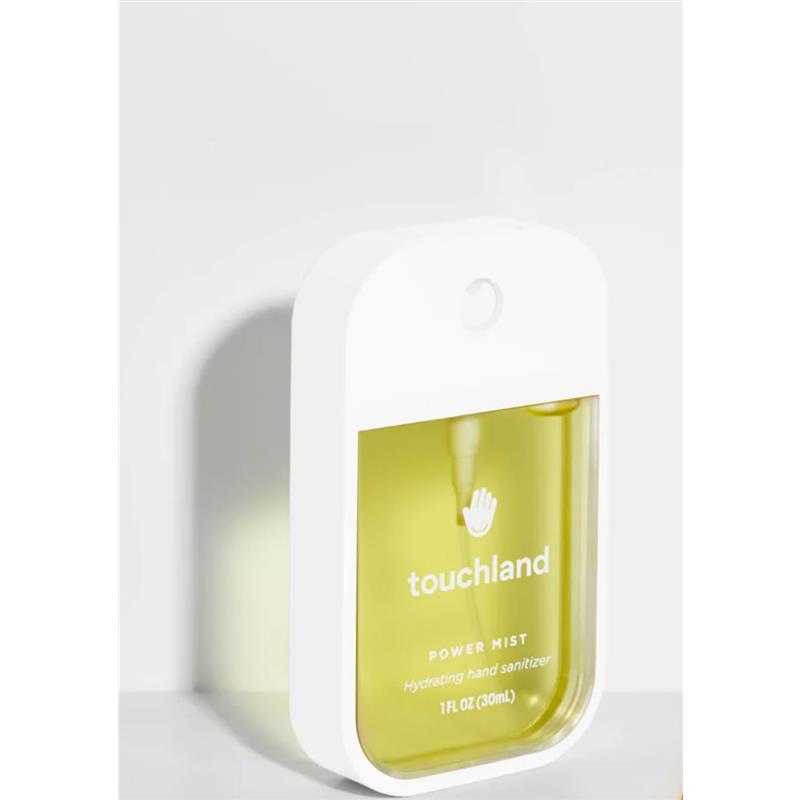 Clear container of Touchland Vanilla Blossom Power Mist Hydrating Hand Sanitizer, 1 fl oz, with a white cap and yellow liquid.