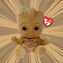 Soft plush Beanie Groot toy with large brown eyes and green leaf accents, featuring a TY tag.