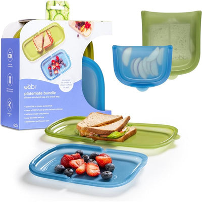 Reusable silicone storage bags in olive and juniper colors, ideal for sandwiches and snacks, displayed with food items.