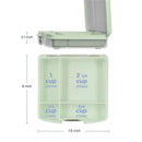 Bento lunch box for kids in sage green with divided compartments labeled for portion sizes and dimensions.