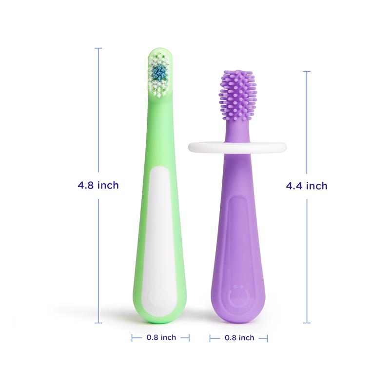 Two colorful toothbrushes in green and purple designed for babies and toddlers, featuring measurement indicators and training grips.