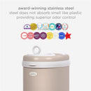 Ubbi stainless steel diaper pail in taupe, featuring a top lid with a handle and various award stickers highlighting its odor control.