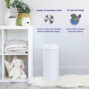 Ubbi Steel Diaper Pail in white, featuring odor-locking capabilities and made from stainless steel, displayed on a shelf with soft toys and blankets.