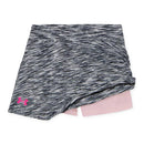 Short sleeved heart twist skort set in prime pink with a black and gray patterned skort featuring Under Armour logo.