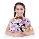 A girl smiles while holding a collection of colorful plush Rainbocorns Puppycorn toys, showcasing their cute designs.