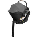 Lightweight Uppababy Aria V2 infant car seat in charcoal melange with safety features and removable base.