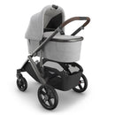 Uppababy Bassinet V3 in Beau color, featuring grey chenille fabric and a graphite frame, suitable for infants.