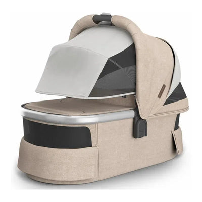 Uppababy Bassinet V3 in Declan color, featuring a silver frame and a removable canopy, designed for infants.