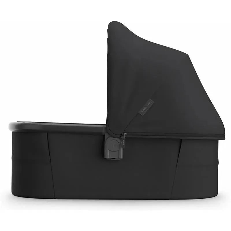 Uppababy Bassinet V3 in Jake (Charcoal) with a charcoal canopy and carbon frame, designed for infant sleeping.